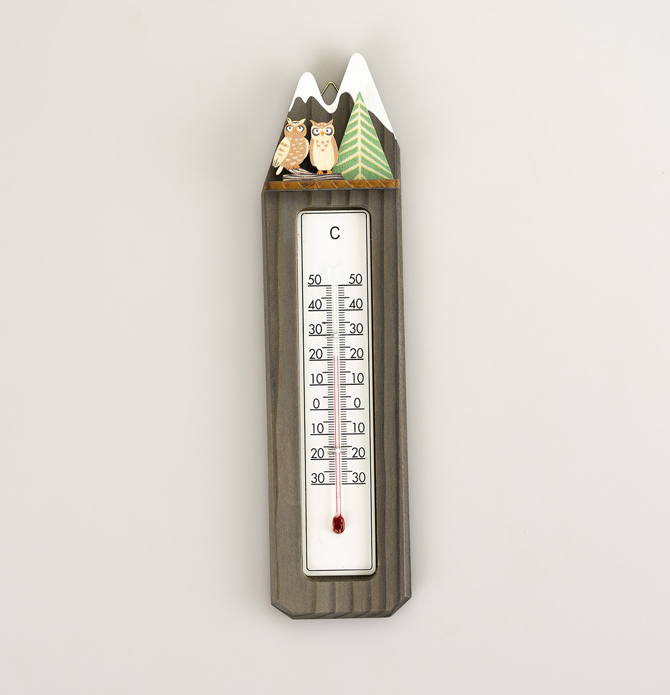 Termometro con applicazioni in legno di abete.