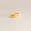 Porta tovaglioli in legno inciso.